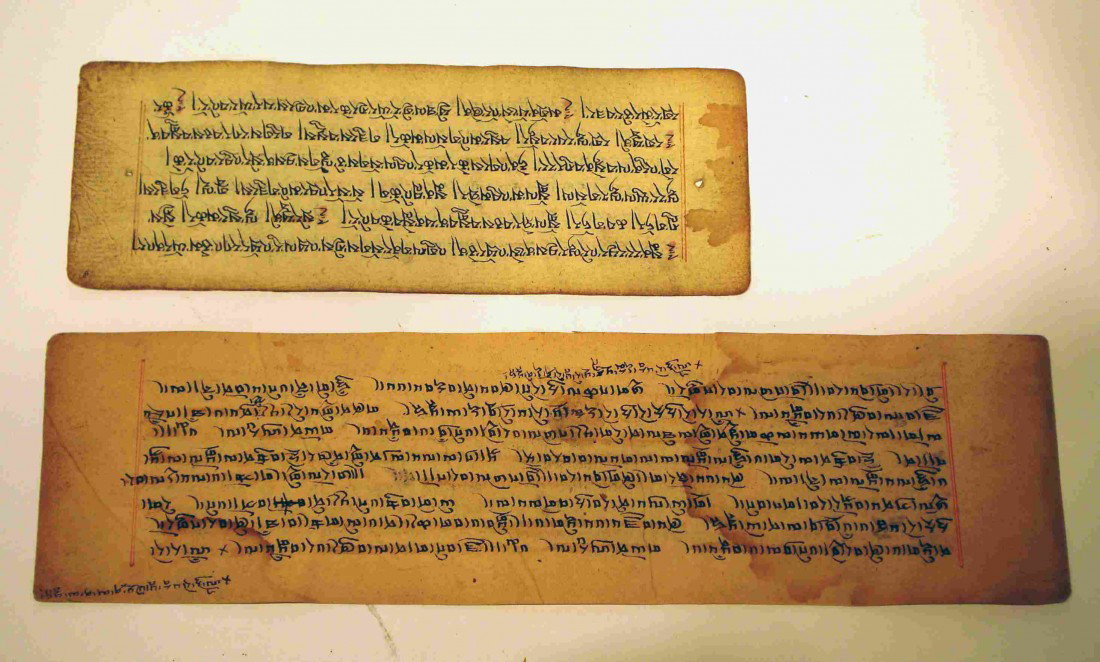 234a: Mongolian or Tibetan manuscript sheet: A rare 18th or 19th century hand written in a rare script. One 3 1/2" X 12; the other 3 X 8 1/2"