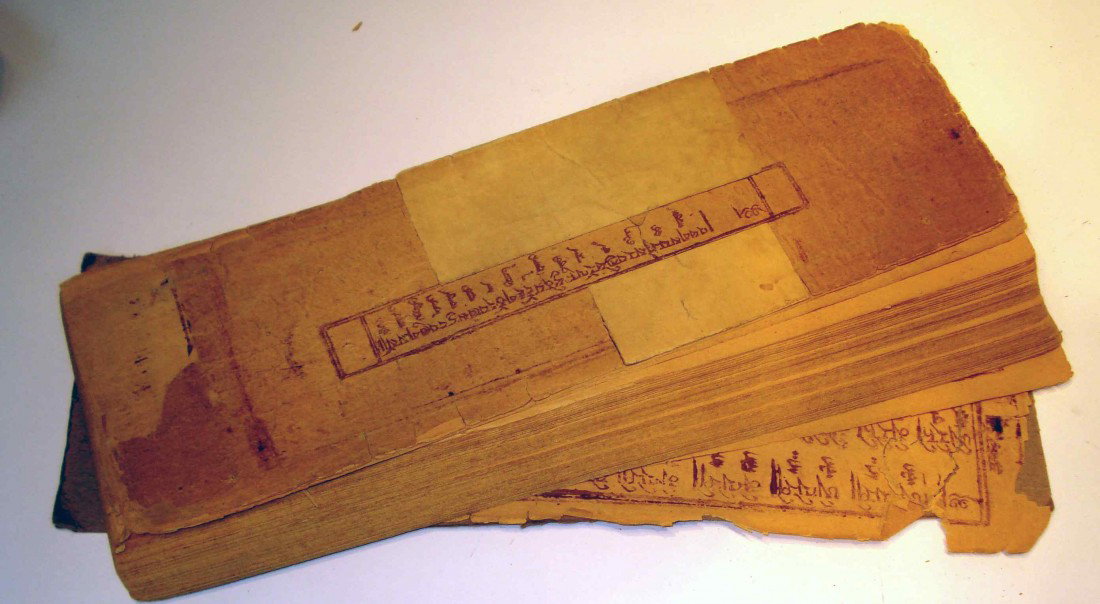 Mongolian Woodblock Manuscript: This rare 18th century Sutra manuscript in ancient Uighur and Tibetan, and complete with 87 pages. The manuscript is printed on 4" X 14" sheets, with 87 pages comprising what may be a book.
