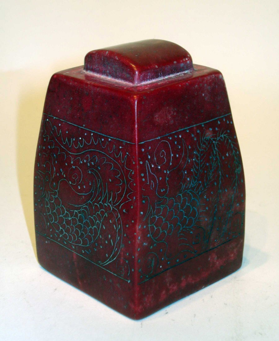 Red Soapstone Seal: A 3 1/4" tall soapstone seal.