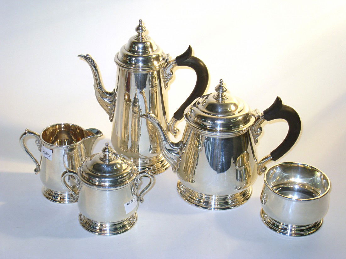Five Piece Sterling Coffee/Tea Set Signed Fishers: A nicely made coffee & tea set in five pieces, stamped Fisher 2310 and sterling. The two kettles made with ebony handles. 68 OzT.