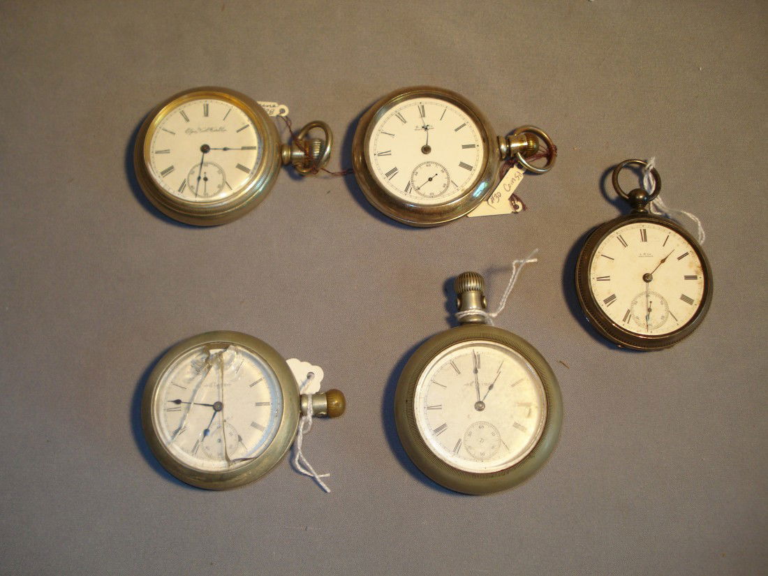 Five Pocket Watches: Three lacking crystals, one with broken crystal, two lacking seconds hands, one lacking minute hand; two in silver cases.