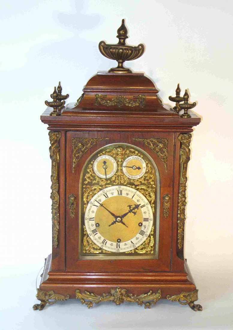 Fine Mahogany Chime Clock: A fine mahogany and fire gilt cased library or mantel clock with engraved and silvered dial, chiming the quarter hours on your choice of bells of gongs. The clockworks by W& H (Winterhalder and Hoffme