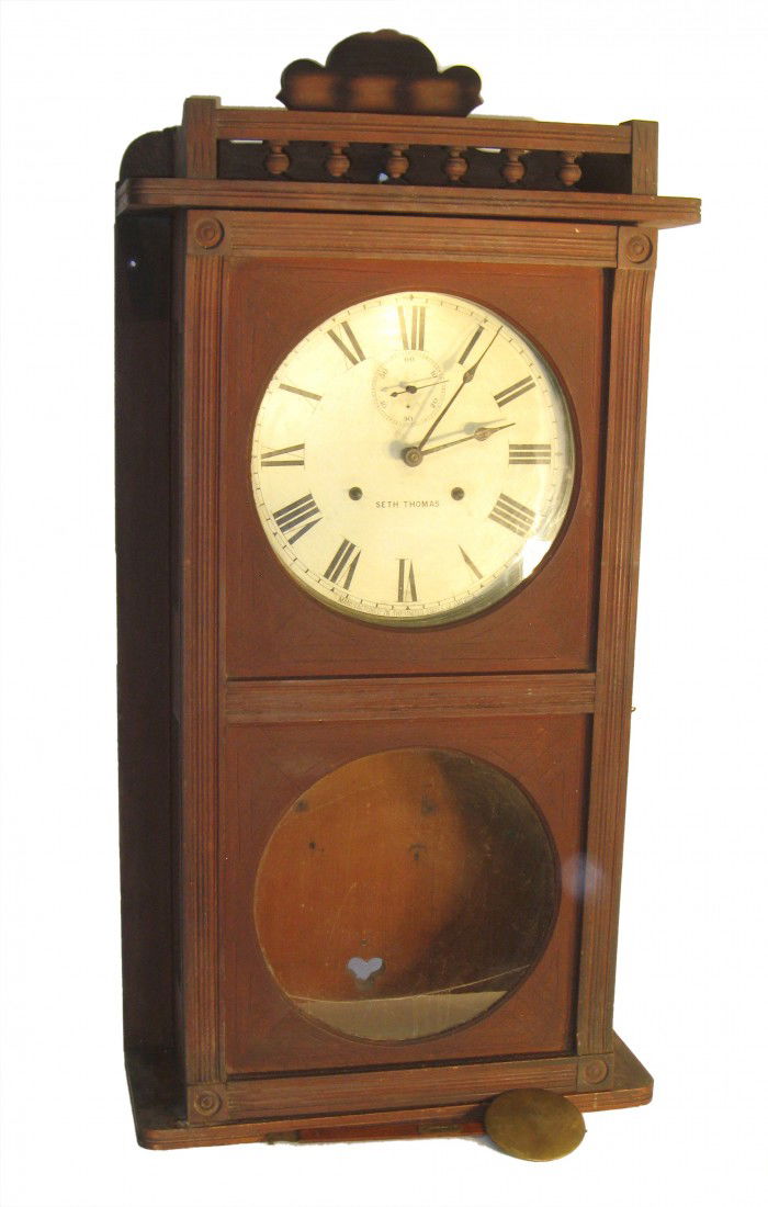 Seth Thomas Wall Clock: A large wall clock, possibly used in a general store, etc, with a clockworks dial signed Seth Thomas with a timepiece movement.