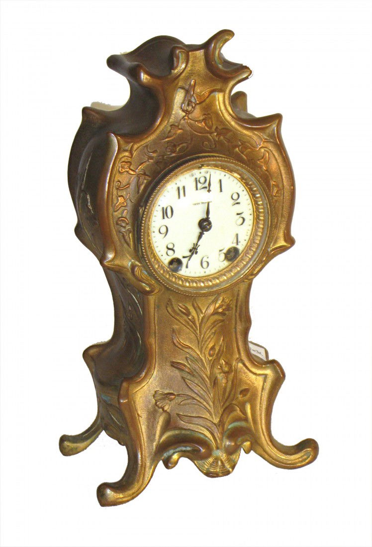 Art Nouveau Mantel Clock: A 13" cast metal and gold plated American mantel clock in the art nouveau style by Seth Thomas. Ca 1890s.