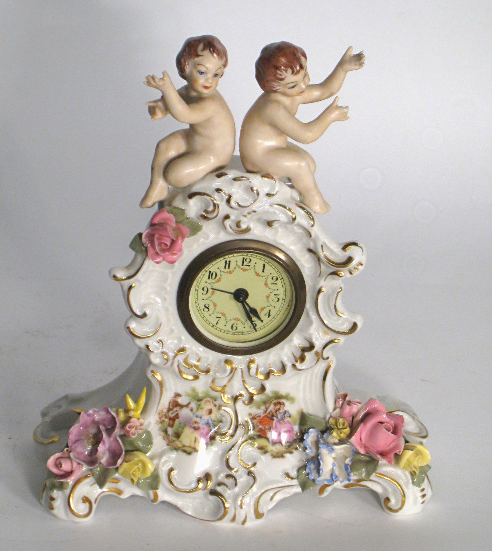 Dresden Ware Desk Clock And Other Clock: In the manner of Dresden, a porcelain desk clock, 13" X 7".