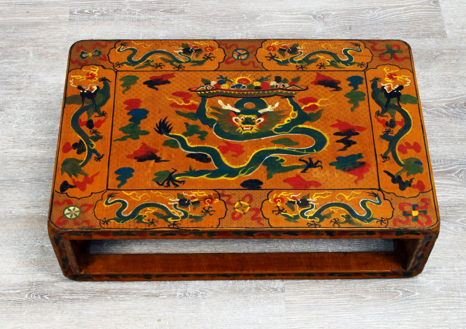 CHINESE ANTIQUE LACQUER KANG DRAGON STAND: CHINESE ANTIQUE LACQUER KANG DRAGON STAND Facing dragon in the center with colorful clouds in the background. Bordered by flying dragons 27 1/2" X 18&q