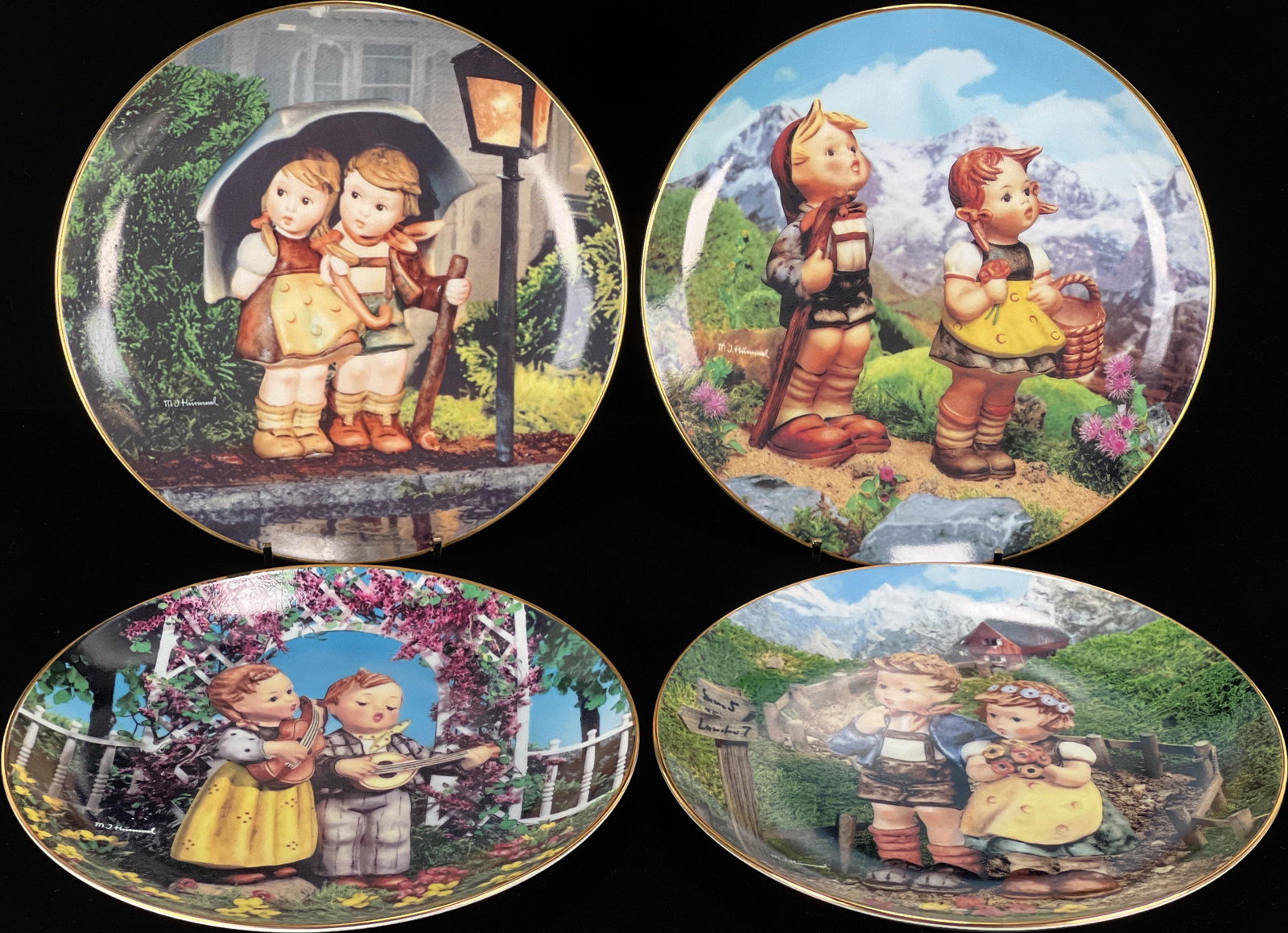 4 DANBURY MINT HUMMEL LITTLE COMPANION PLATES: 4 DANBURY MINT HUMMEL LITTLE COMPANION PLATES Four plates include "Little Musicians", "Country Crossroads", 'Stormy Weather", and 'Little Explorers".