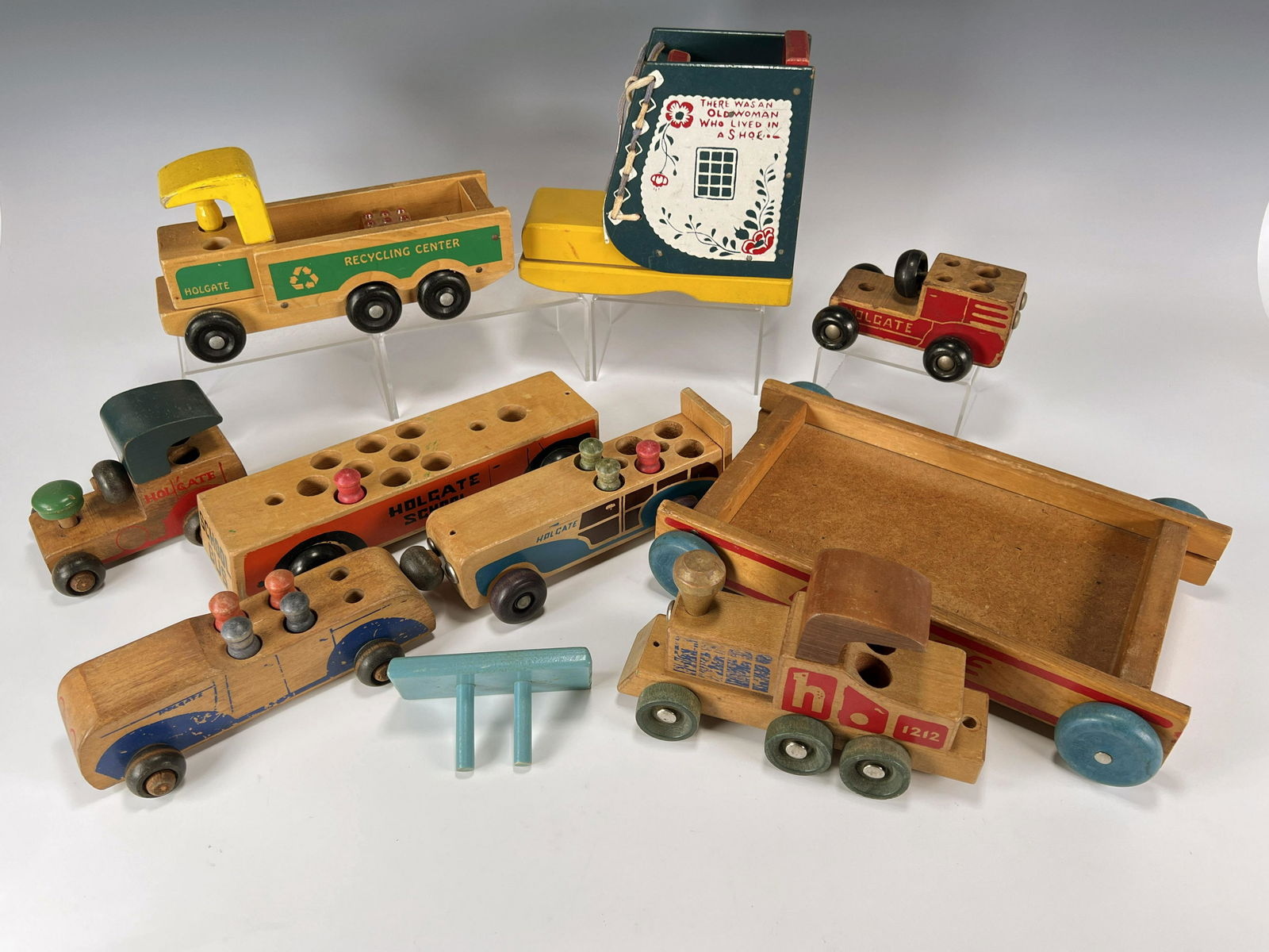 LOT OF ANTIQUE HOLGATE TOY CO. WOODEN TOYS: LOT OF ANTIQUE HOLGATE TOY CO. WOODEN TOYS Variety of wooden toys from Holgate Toy Co. Some from the 1940's and 50's, some more modern. 10" <