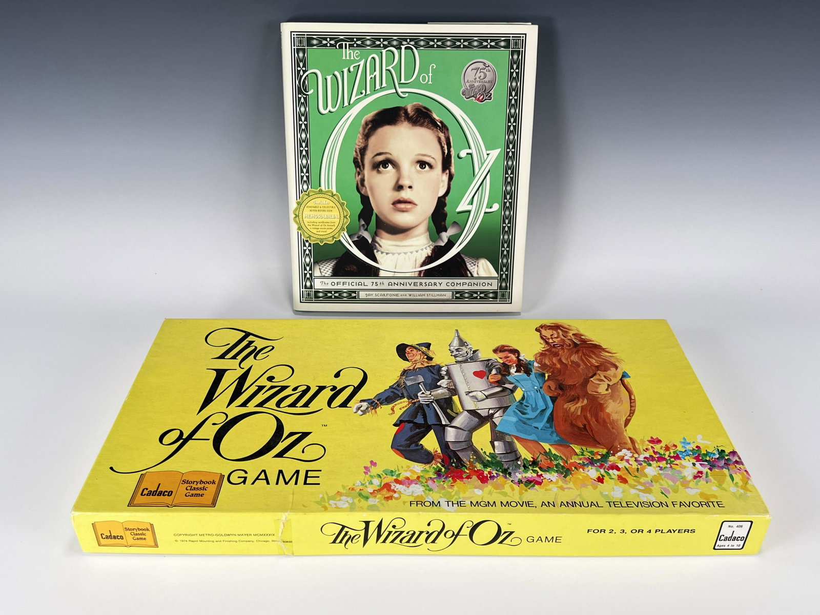 WIZARD OF OZ GAME & 75TH ANNIV. BOOK WITH MEMORABILIA: WIZARD OF OZ GAME & 75TH ANNIV. BOOK WITH MEMORABILIA The Wizard of Oz Official 75th Anniversary Companion book by Jay Scarfone and William Stillman, HCDJ along with memorabilia pack