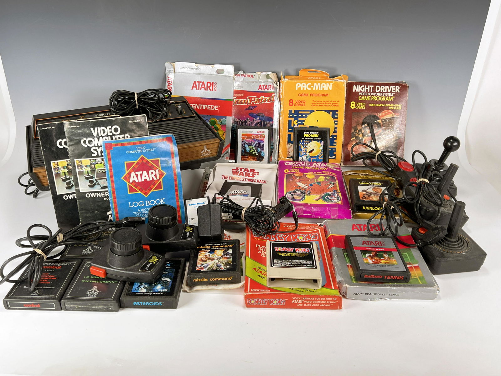 ATARI 2600 COLLECTION SIX SWITCH CONSOLE AND BOXES (1 of 5)