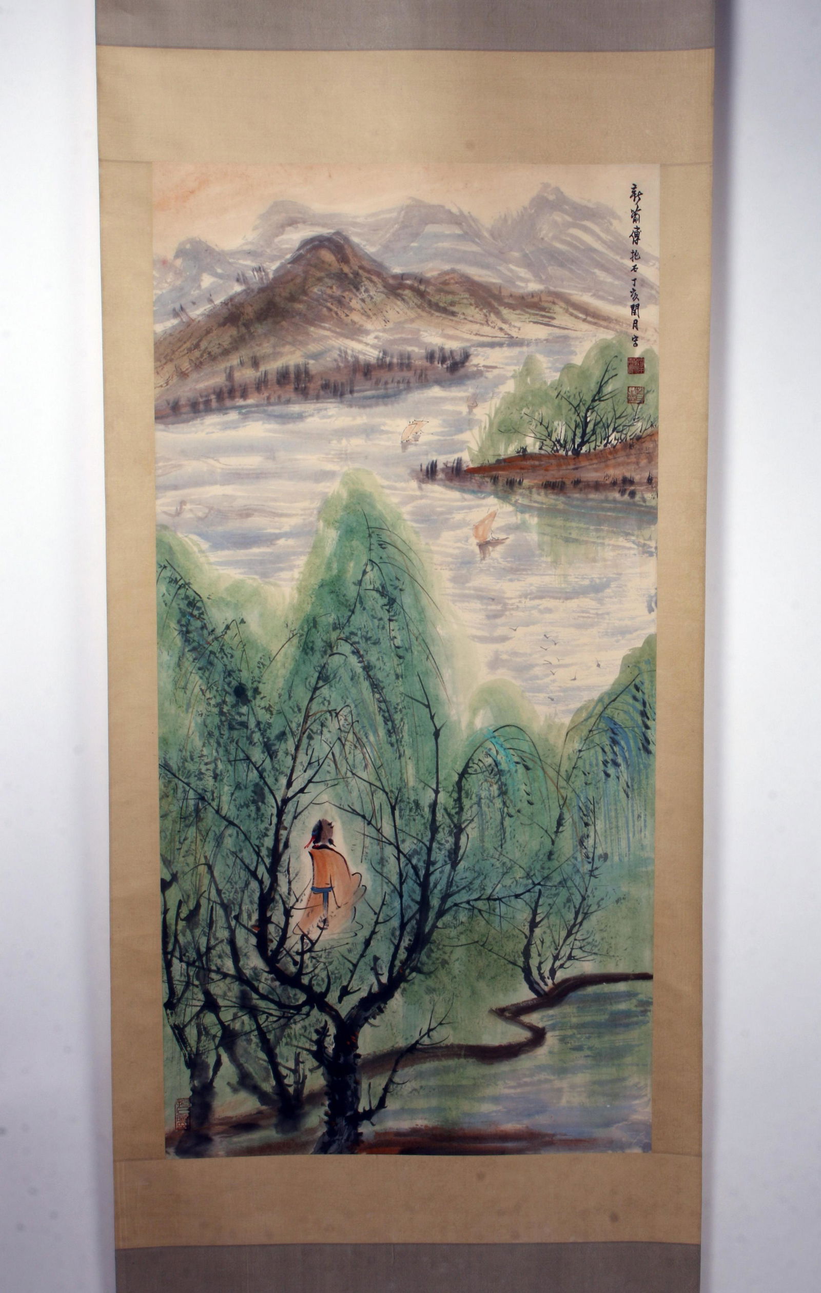 CHINESE SCROLL OF SCHOLAR IN NATURE: CHINESE SCROLL OF SCHOLAR IN NATURE A scholar walks through a lush treed area toward a body of water with small boats in the distance. Calligraphy and arti