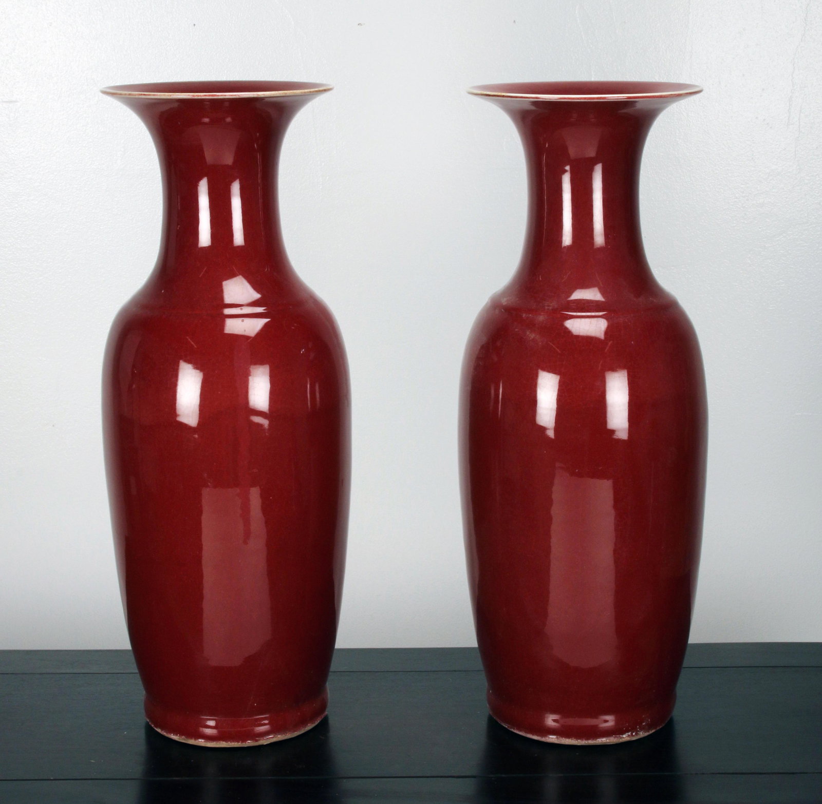 PAIR CHINESE TALL OXBLOOD VASES (1 of 8)