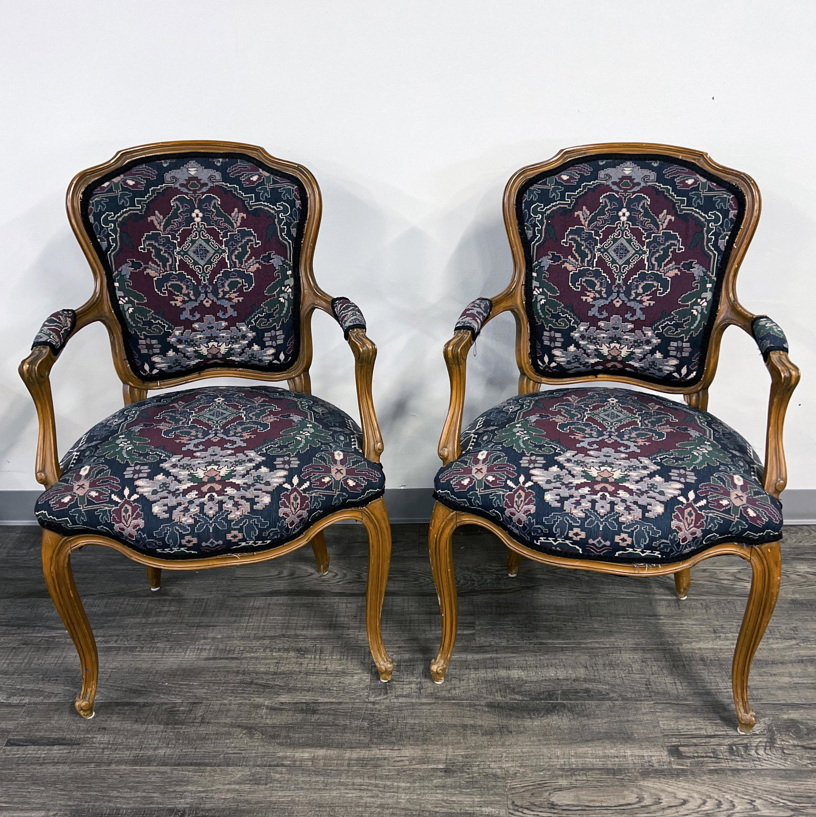 PAIR UPHOLSTERED LOUIS XV STYLE FAUTEUIL ARMCHAIRS: PAIR UPHOLSTERED LOUIS XV STYLE FAUTEUIL ARMCHAIRS Upholstered back with exposed wood frame. 38 1/2" x 25" x 23 1/2" Shi