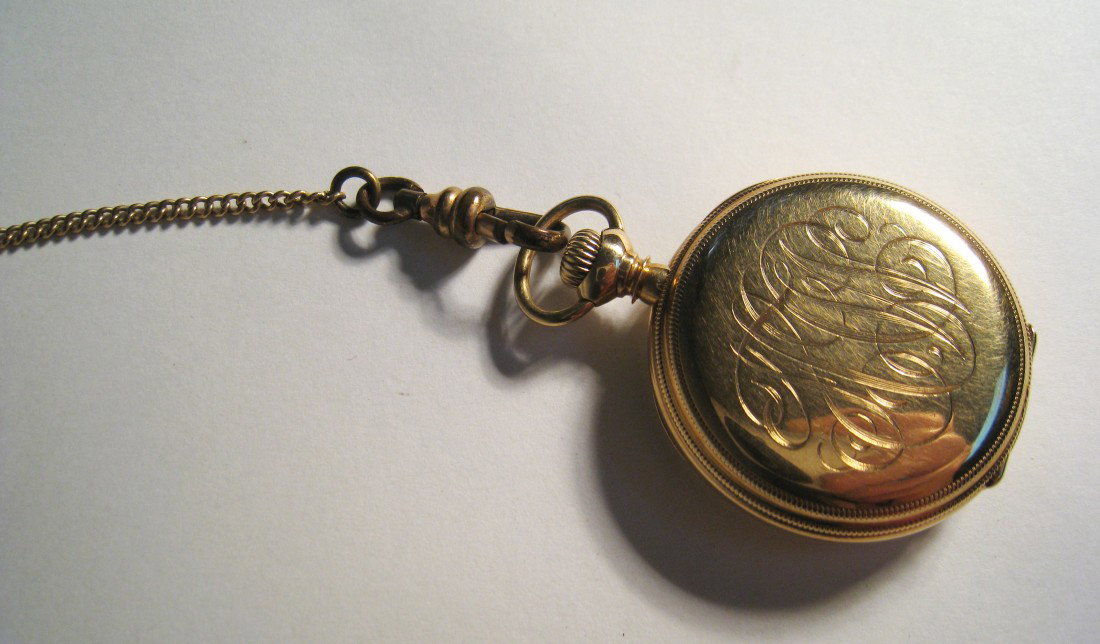 Gold Pendant Watch: A nice looking pendant watch by Waltham, but sold through G. W. Russell in Philadelphia in 1906. The 14K gold case with a 17 jewel watch, over 100 years old.