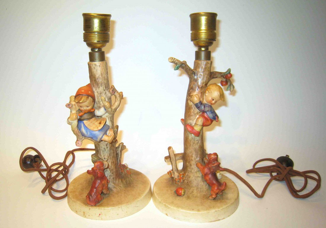 Two Hummel Porcelain Lamps.: Two 11 1/2" lamps Hummels both with the Goebel mark, in the girl/boy theme.