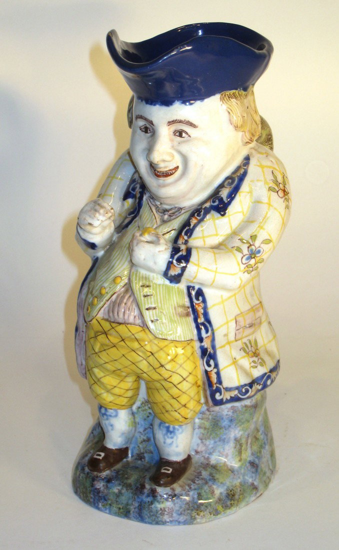 Faience Mug: The snuff man, a five color French Faience ceramic ware mug of a man and his snuff. 19th century.
