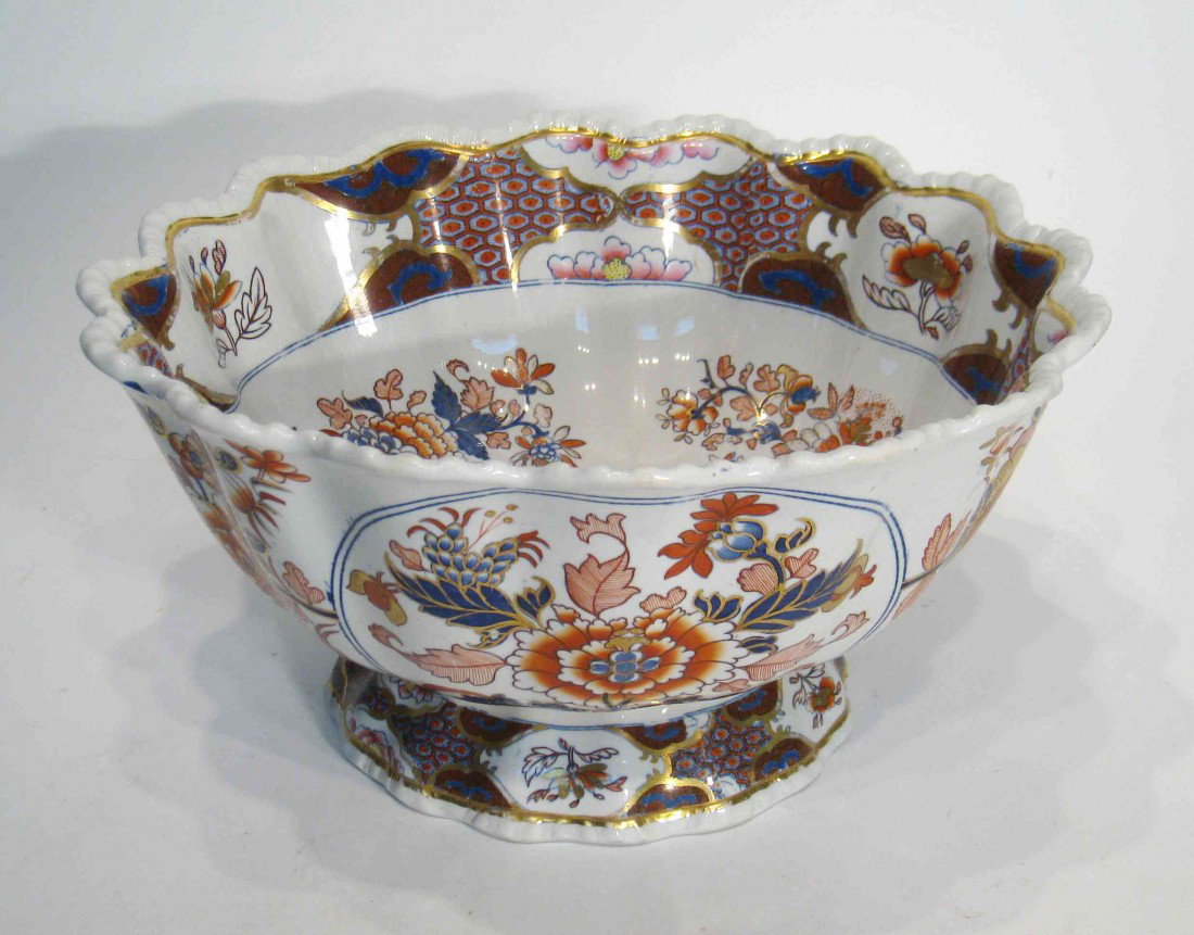 Punch Or Center Piece Bowl: A Faience like ceramic footed centerpiece of punch bowl, about 12" in diameter.