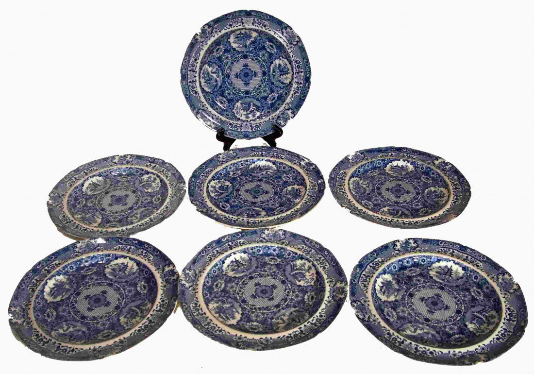 Seven Matching Blue And White Plates: 10" plates in the Chinoiserie style and blue and white, with some the Spode stamp is partially visible.