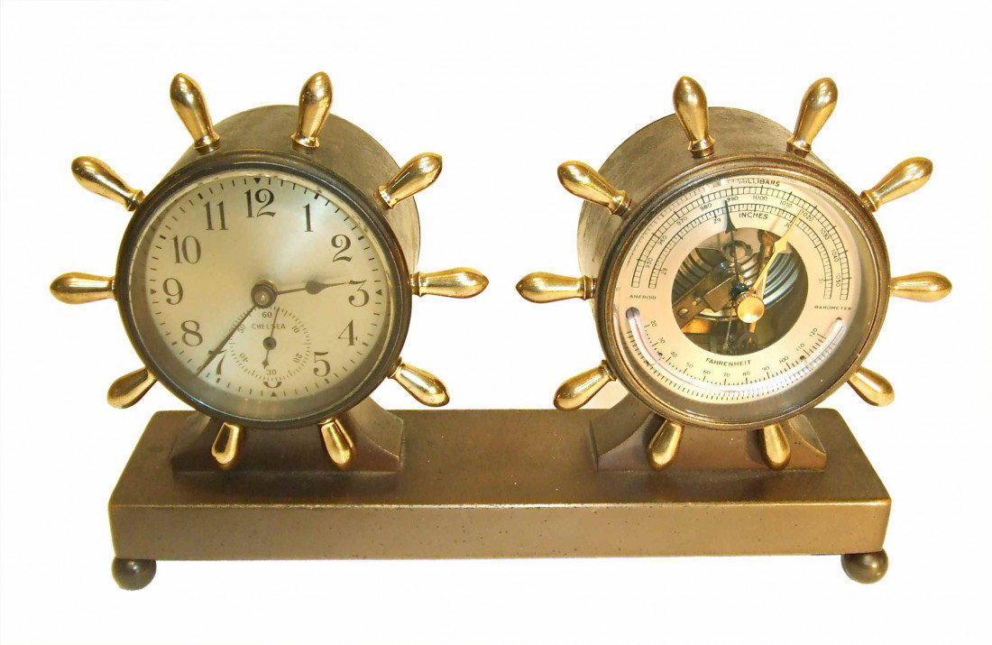Chelsea Desk Set: An 8 1/2" long cast bronzed and brass desk set consisting of a 2 1/2" timepiece with a seconds hand and a weather station with an aneroid barometer and thermometer.