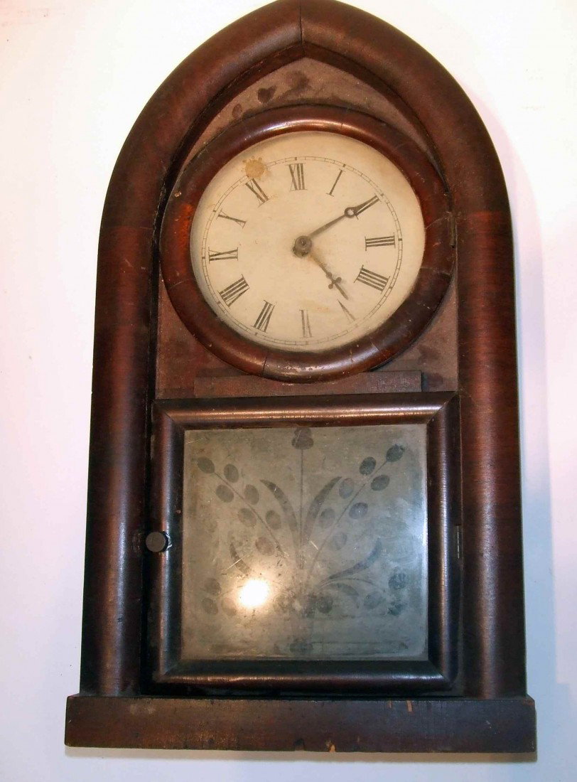 Beehive Clock : An American mid 19th century beehive clock by New Haven. Although in "as found" condition, the essentials are original: an original etched glass panel, a painted white dial, and probably original fini