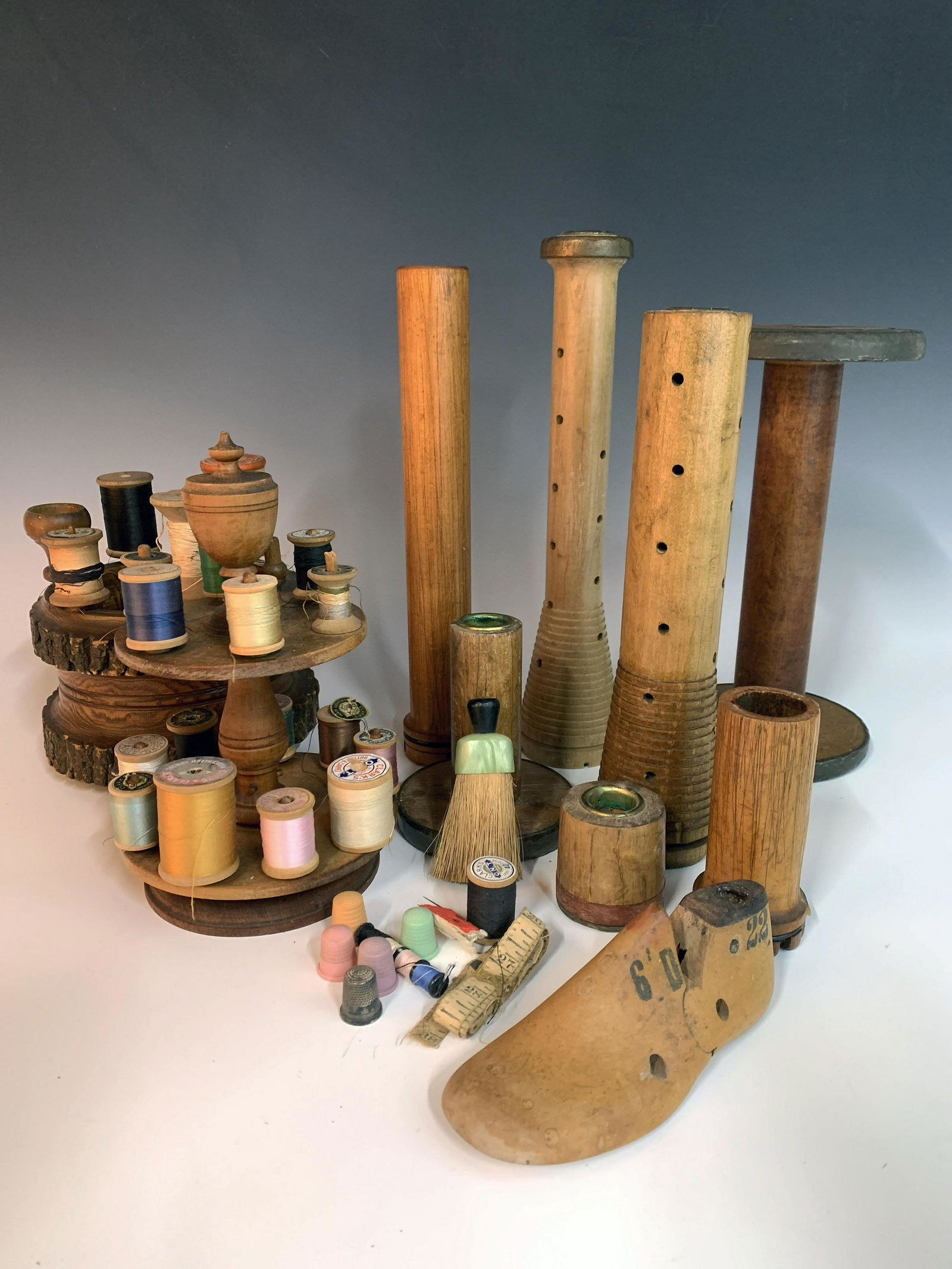 VINTAGE SEWING ITEMS SPOOLS, BOBBINS, SHOE LAST (1 of 4)