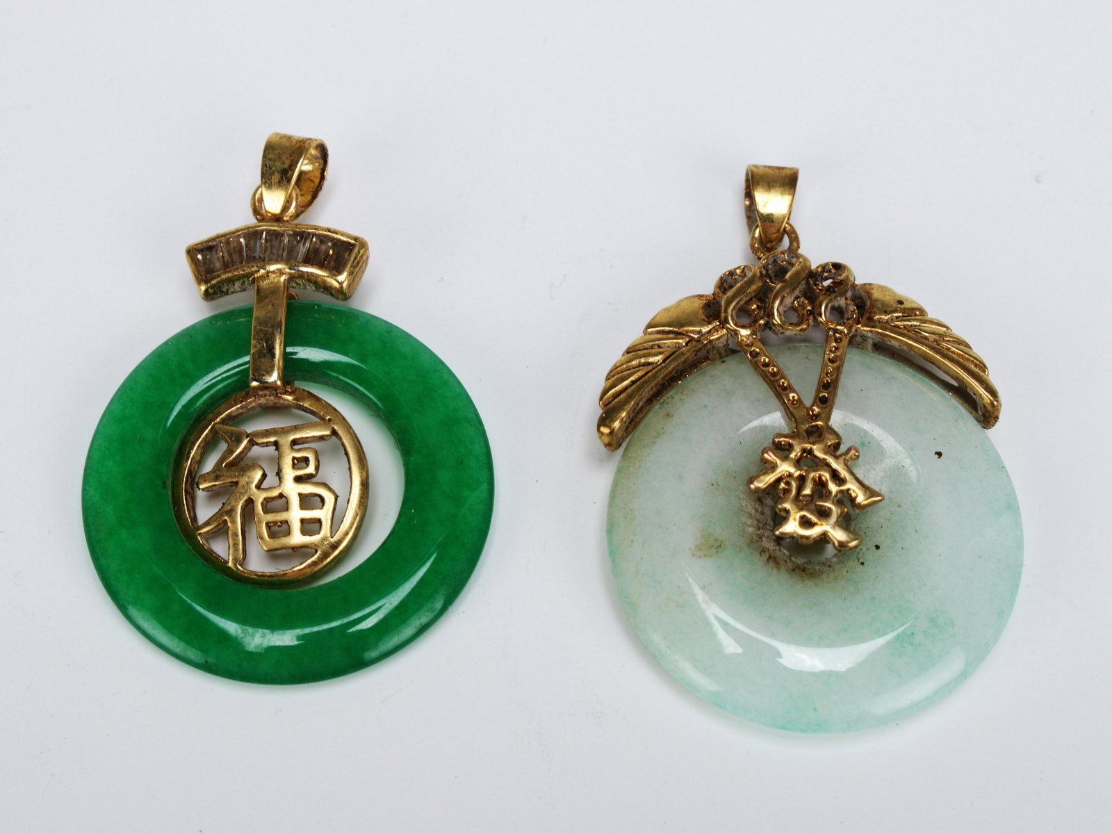 TWO GREEN JADE BI DISC PENDANTS (1 of 4)