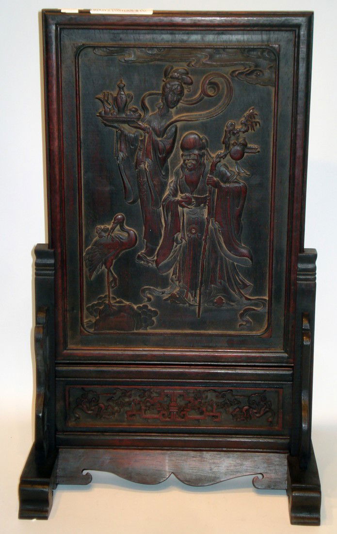 Antique Carved Screen: A 22" table screen (13" wide) with a panel carved in bas relief featuring a lady with tea and a wise man and herons.