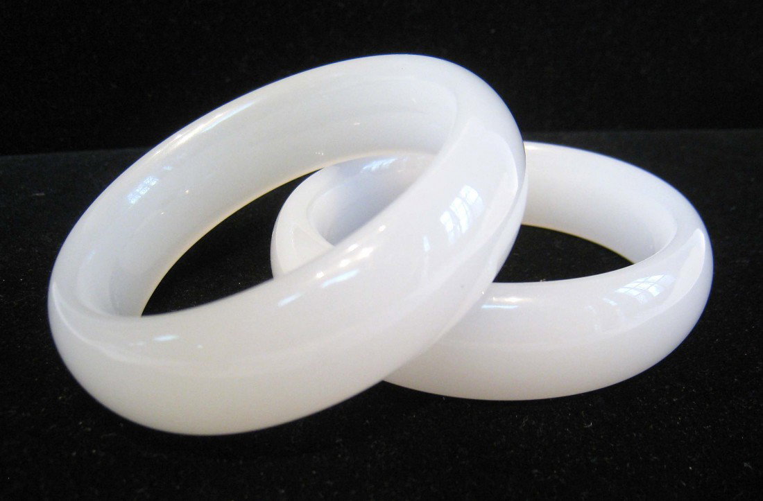Pair Of White Jade Bangle: A pair of white jade bangles, with outside diameter of 3", inside diameter of 2 1/4".