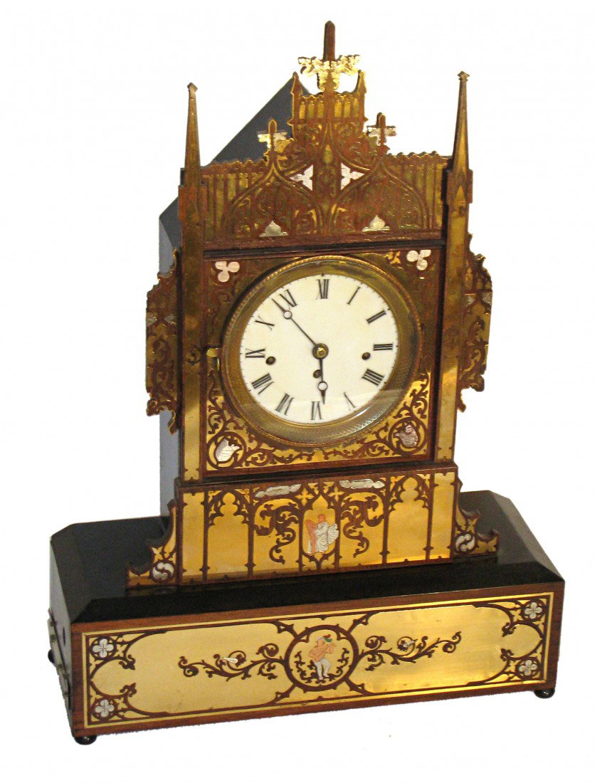 Austrian Clock With Music Box: An alabaster dialed 19th century Austrian musical clock. The clocks functions as a striking clock which additionally plays a musical tune on the hour.