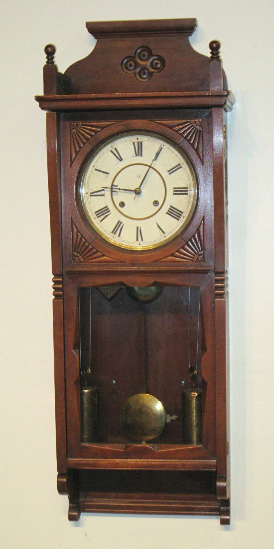 Seth Thomas "Floral" Wall Clock: A late 19th century American 38" wall clock, the "Floral" by Seth Thomas.