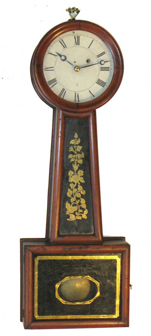 New England Banjo Timepiece: A mid 19th century New England banjo timepiece presented with original reverse painted glasses and grain painted wood casement with a weight driven timepiece movement in excellent mechanical condition