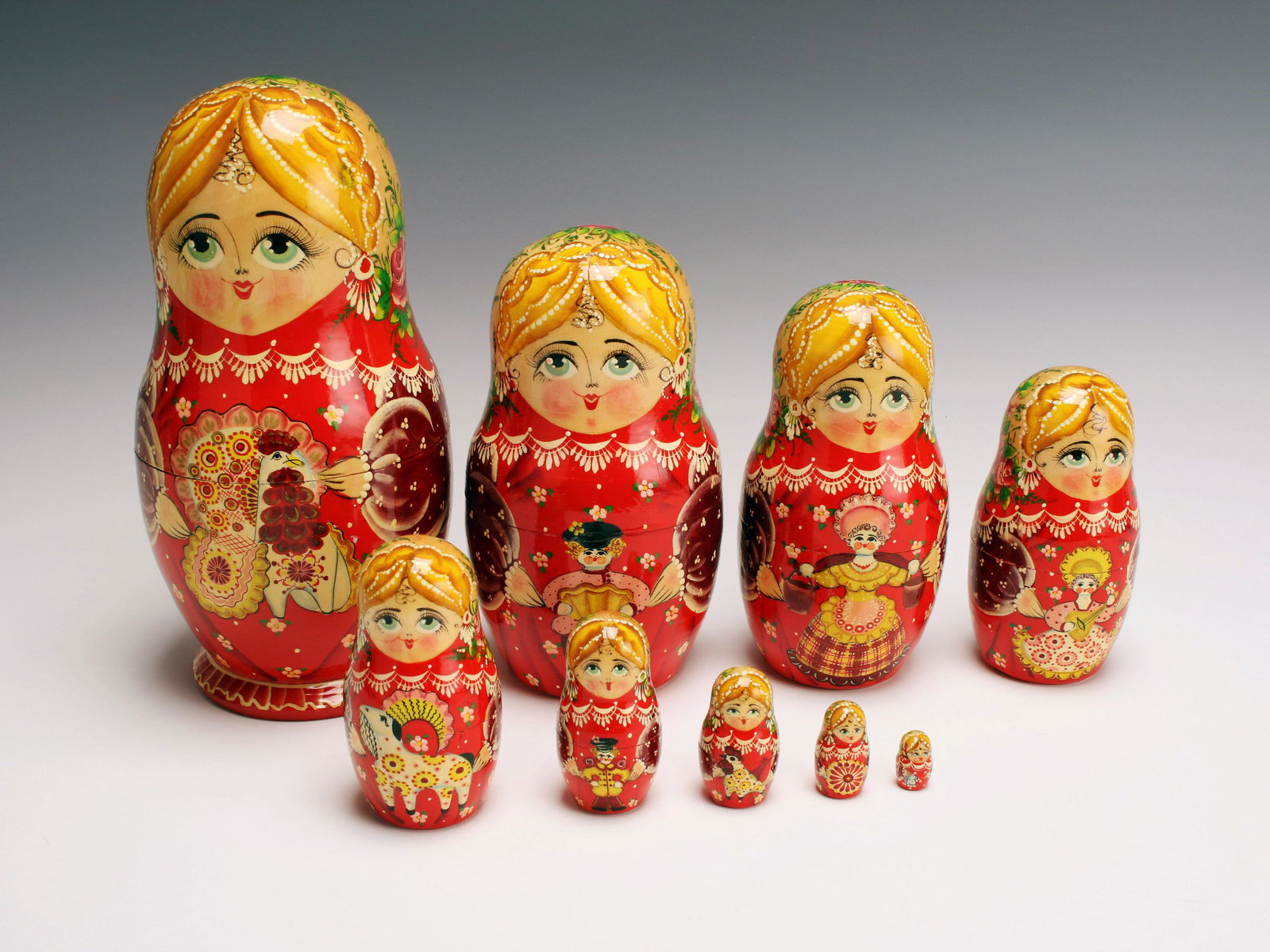 NINE PIECE HAND PAINTED RUSSIAN NESTING MATRYOSHKA SET OF VILLAGE FAMILY (1 of 6)