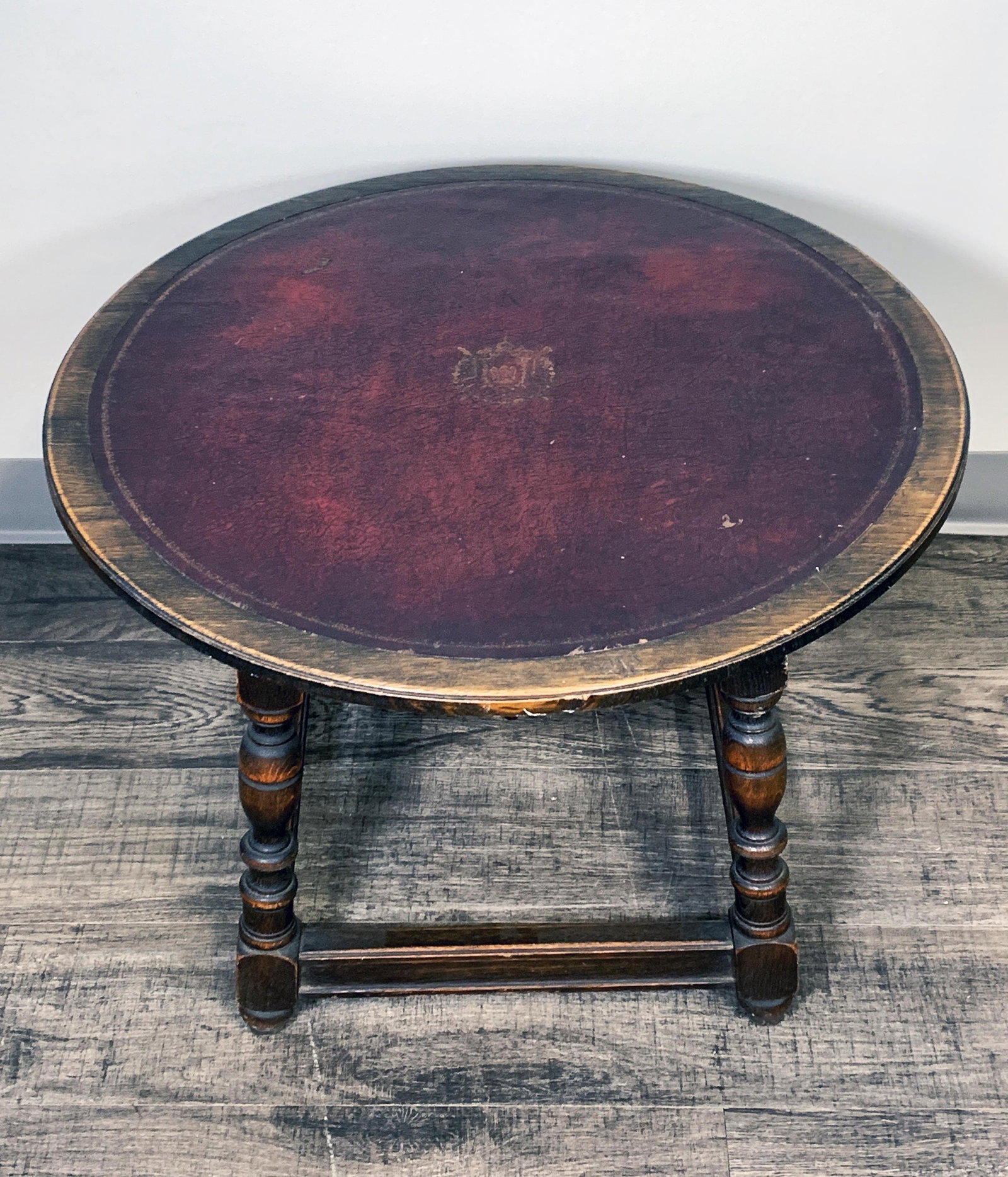 VINTAGE LEATHER TOPPED ROUND COFFEE TABLE (1 of 5)
