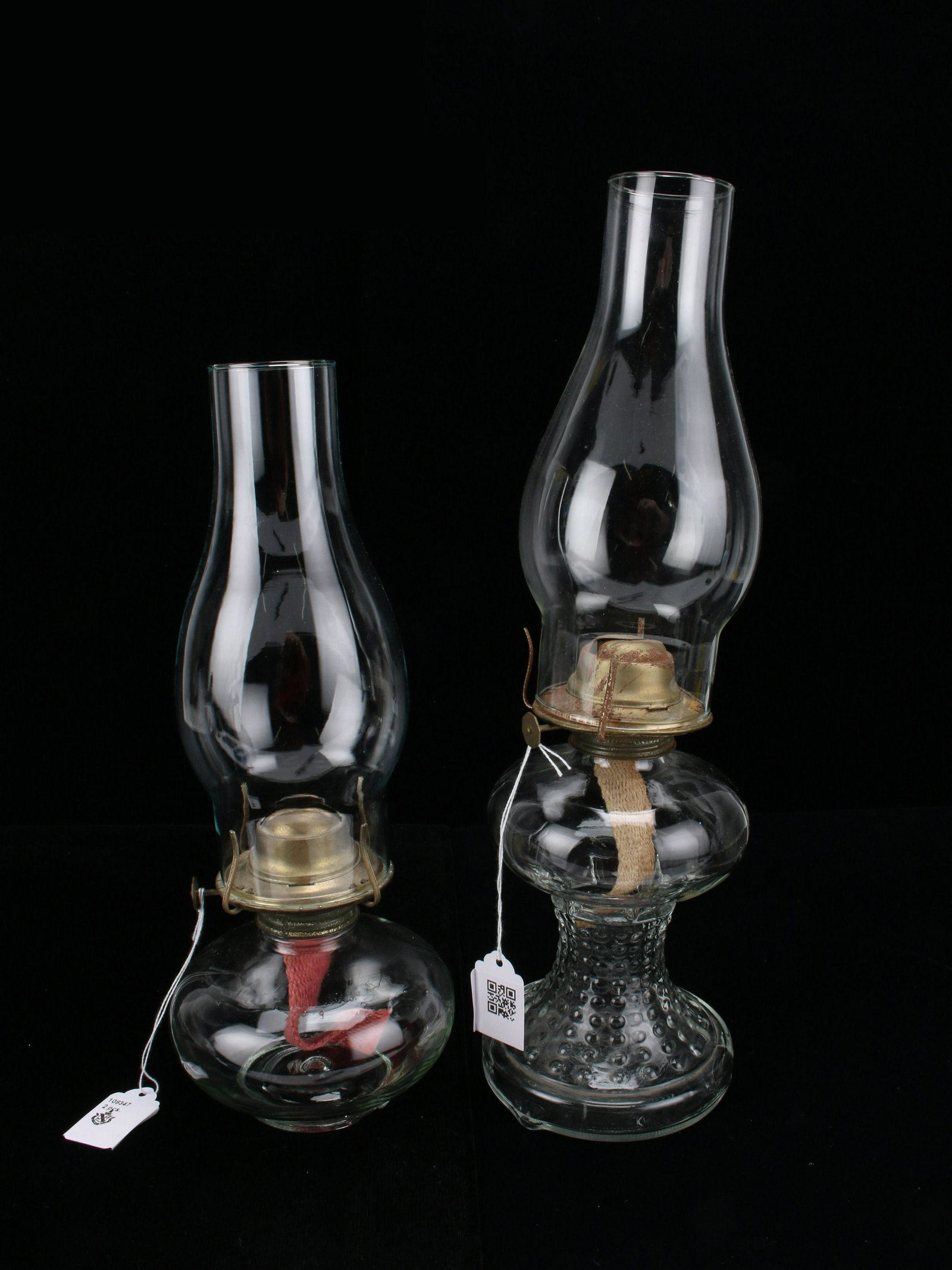 TWO GLASS OIL LAMPS: TWO GLASS OIL LAMPS