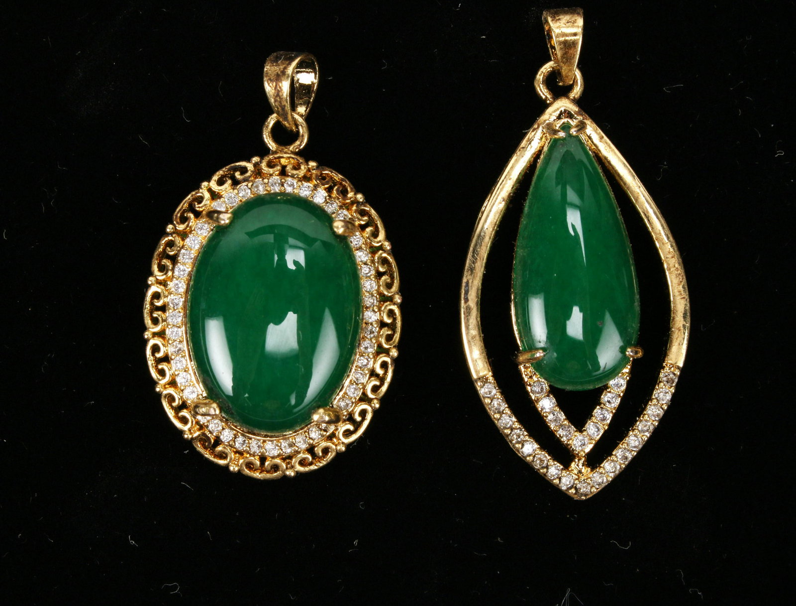 TWO JADE PENDANTS (1 of 3)