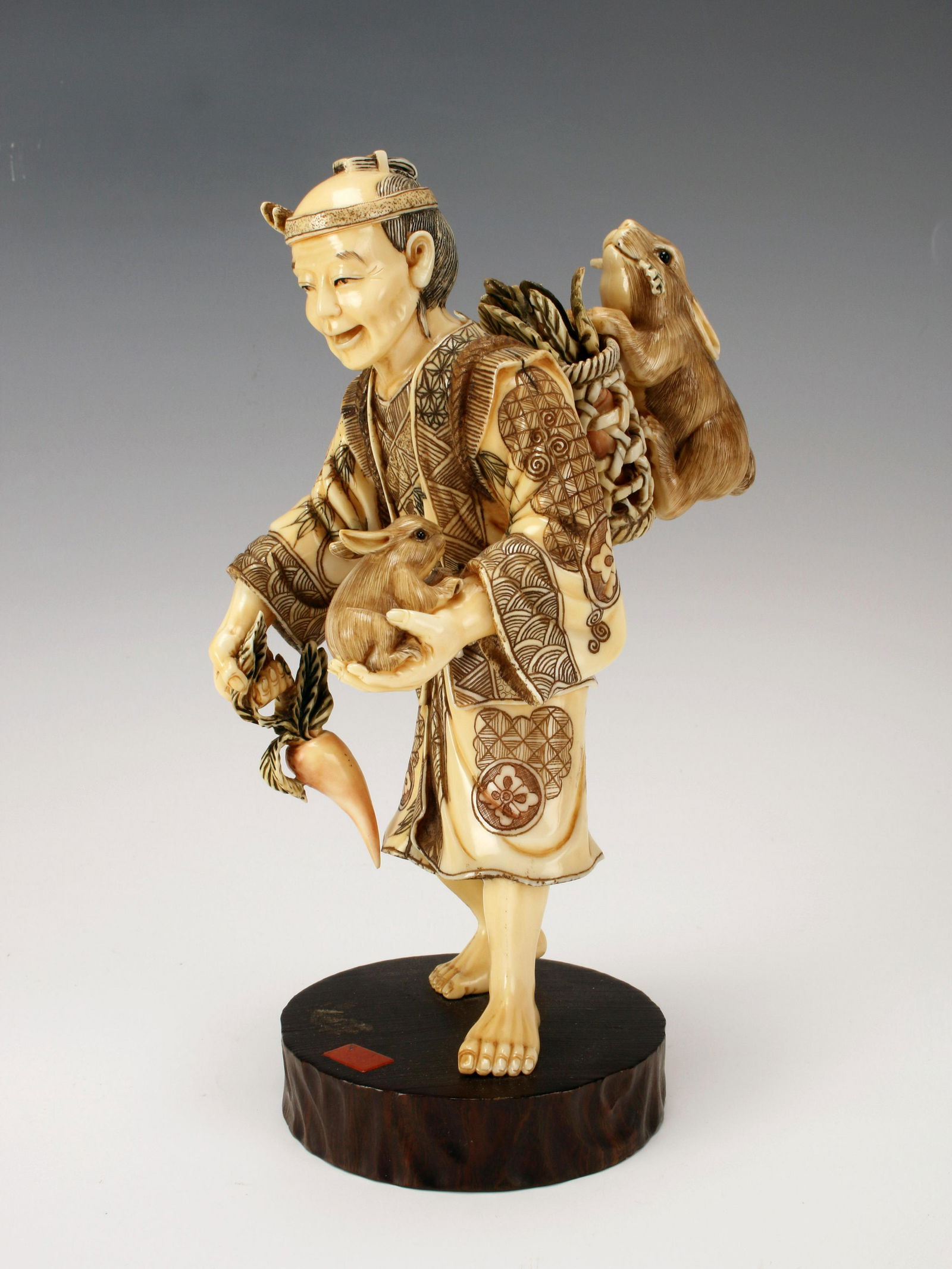 CARVED RESIN FIGURE WITH RABBITS (1 of 8)