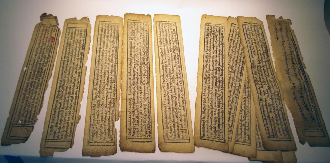 Mongolian Woodblock Printed Manuscript: The document of Tibetan or Mongolian interest, complete with 18 pages. Each sheet about 4" X 23". Shipping: We are able to pack and ship this item to an address in the United States for $30.00 via USP