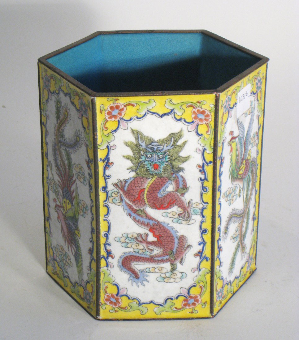 Enamel Brush Pot: A six inch six sided brush pot of multi colored enamel decorated outside with alternating panels depicting dragons and mythical birds and with a turquoise interior. 6 1/2" tall. Shipping: We are able