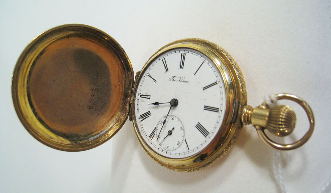 Ladies Pocket Watch "The Nassau": In a gold filled hunting cased case with a jeweled movement needing repair 32.5 mm. Lacking crystal, without a hinge spring. Shipping: We are able to pack and ship this item to an address in the Unite