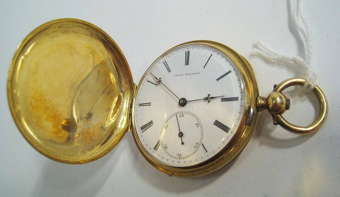 Gold Pocket Watch: A gold and enamel hunting cased pocket watch, either 14K or 18K (with a faint hallmark) having a key wind 15 jewel lever pocket watch by Jules Huouenin (Swiss). case 42.5 mm. Shipping: We are able to