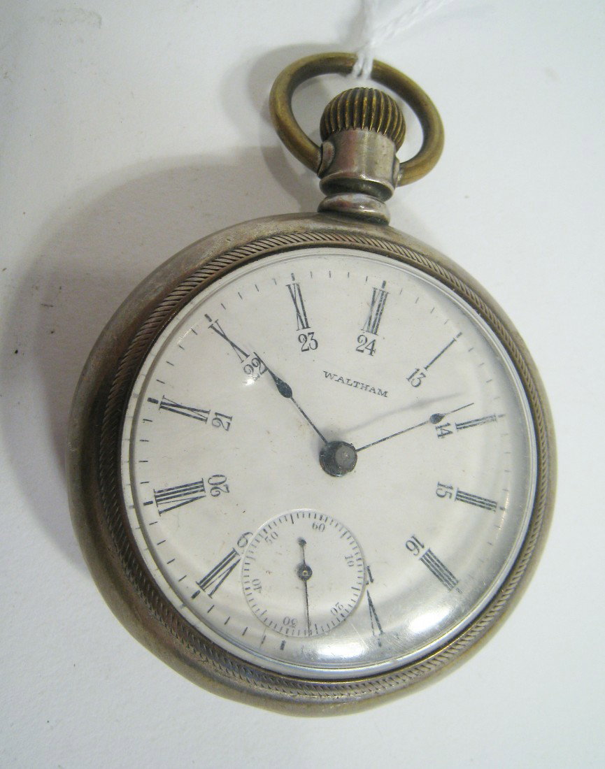 Waltham Watch With 24 Hour Dial: An American Waltham 18 size 15 jewel watch in an open faced sterling silver case 8866072. Shipping: We are able to pack and ship this item to an address in the United States for $15.00 via USPS Priori