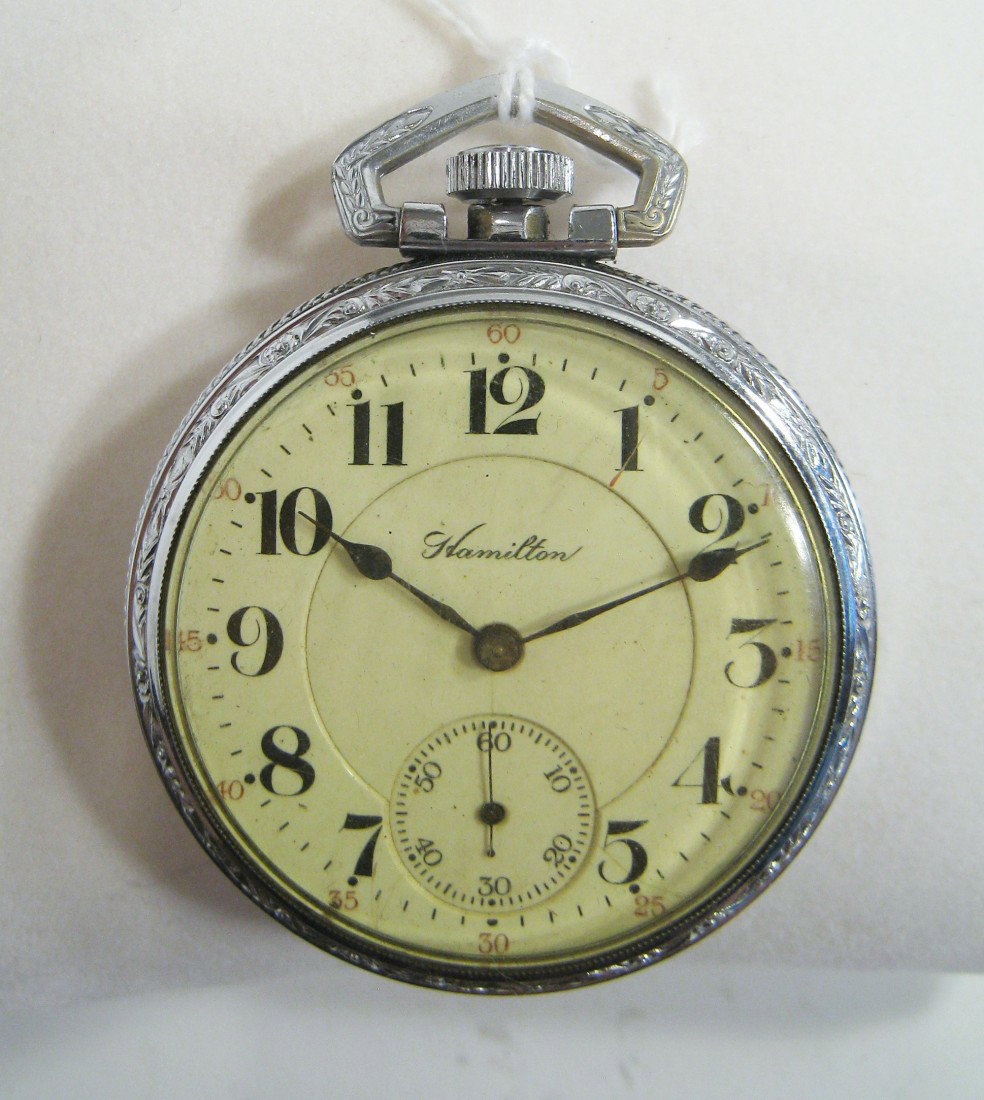 Hamilton Model 992 Watch: A finely decorated 16 size Hamilton open faced steel cased 21 jewel pocket watch . Running. 889606. Yellowed plastic crystal. Shipping: We are able to pack and ship this item to an address in the Unit
