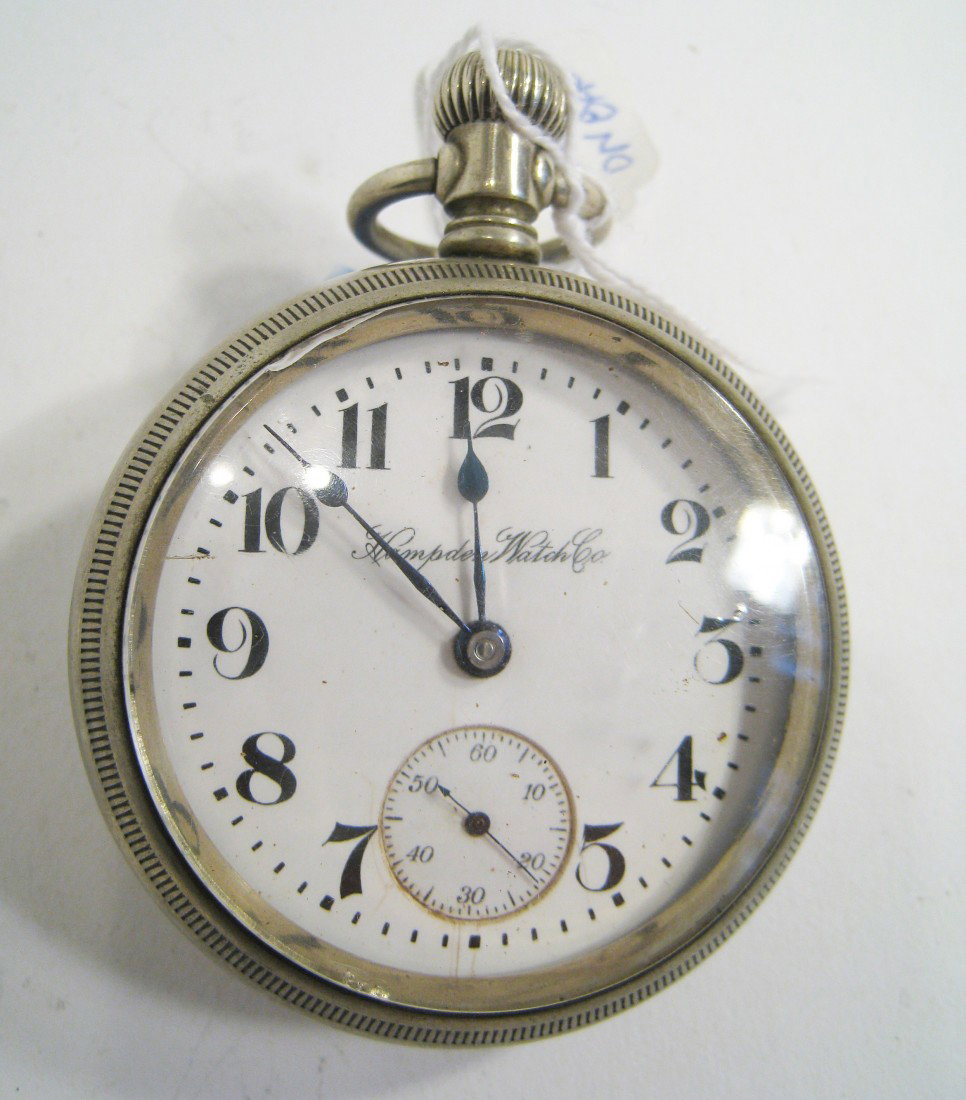 Dueber Watch: An 18 size watch in a nickel silver case with a 15 jewel movement #8754942. Running. Shipping: We are able to pack and ship this item to an address in the United States for $15.00 via USPS Priority Ma