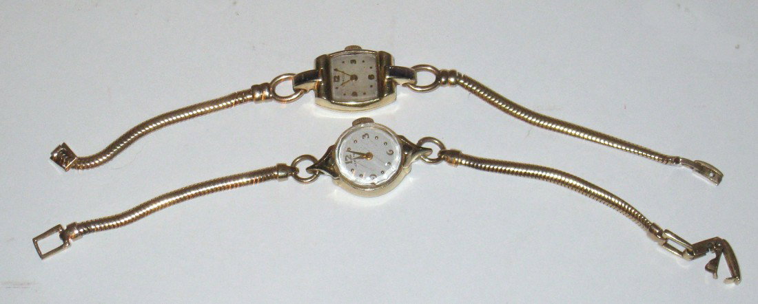 Two 14k Gold Ladies Wrist Watches: A 14K gold ladies dress wrist watch by Concord with a flexible band and one by Hamilton. Both watches are running Shipping: We are able to pack and ship this item to an address in the United States fo