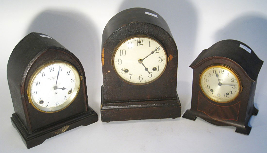 Three American Mantel Clocks: All Seth Thomas clocks with one having a lever escapement, the other two pendulum escapements, with one of the pendulum bobs missing. No keys. All in good condition considering their age. Shipping: We