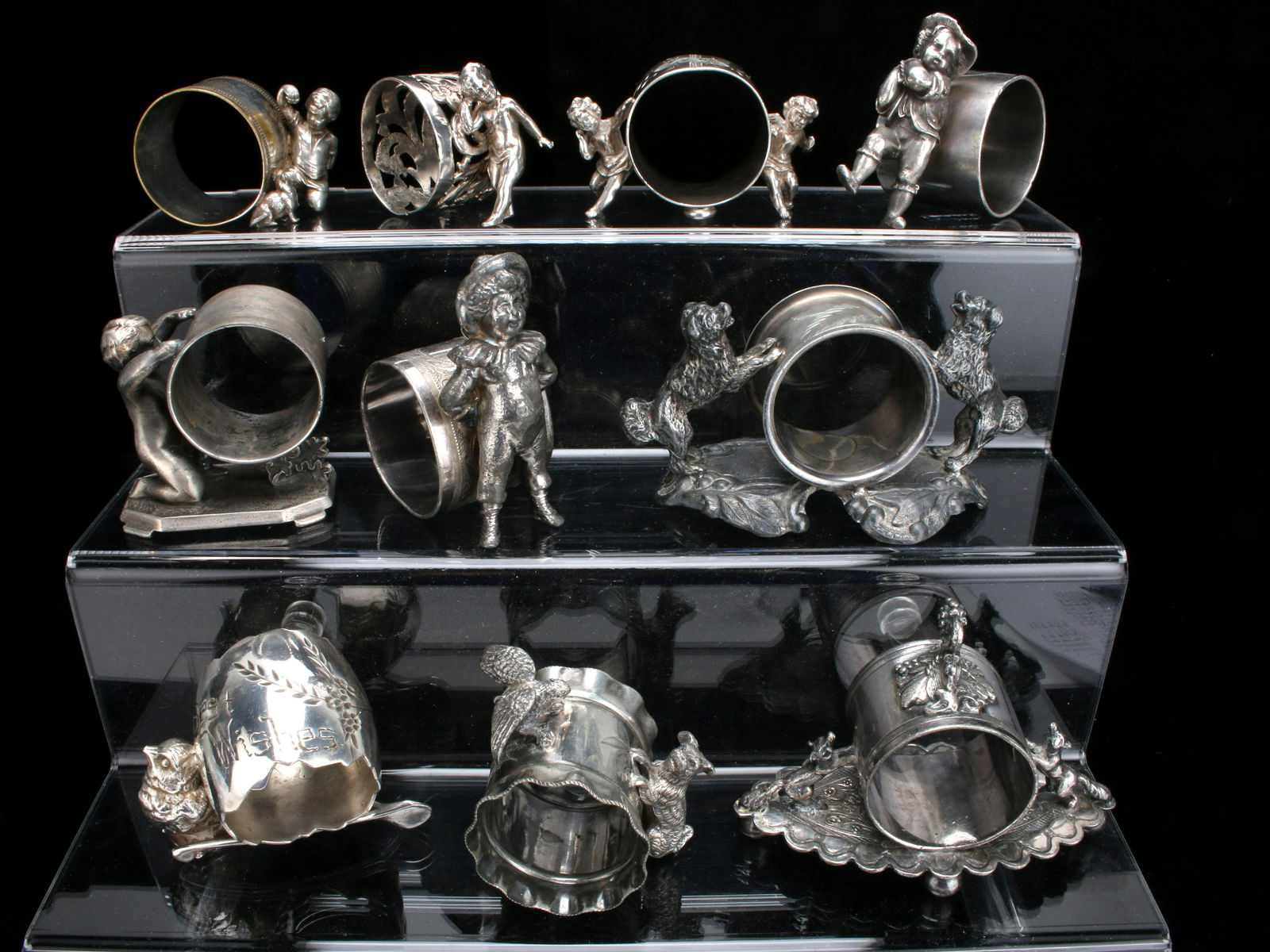 TEN MARVELOUS ANTIQUE FIGURAL SILVER PLATE NAPKIN RINGS: TEN MARVELOUS ANTIQUE FIGURAL SILVER PLATE NAPKIN