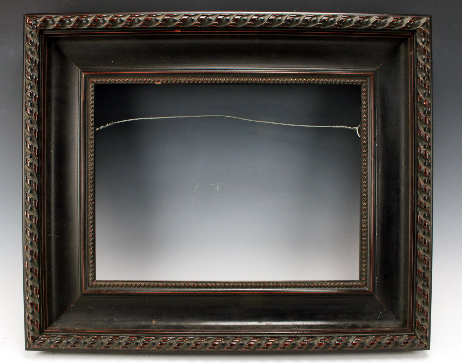 ORNATE BLACK WOODEN FRAME: ORNATE BLACK WOODEN FRAME