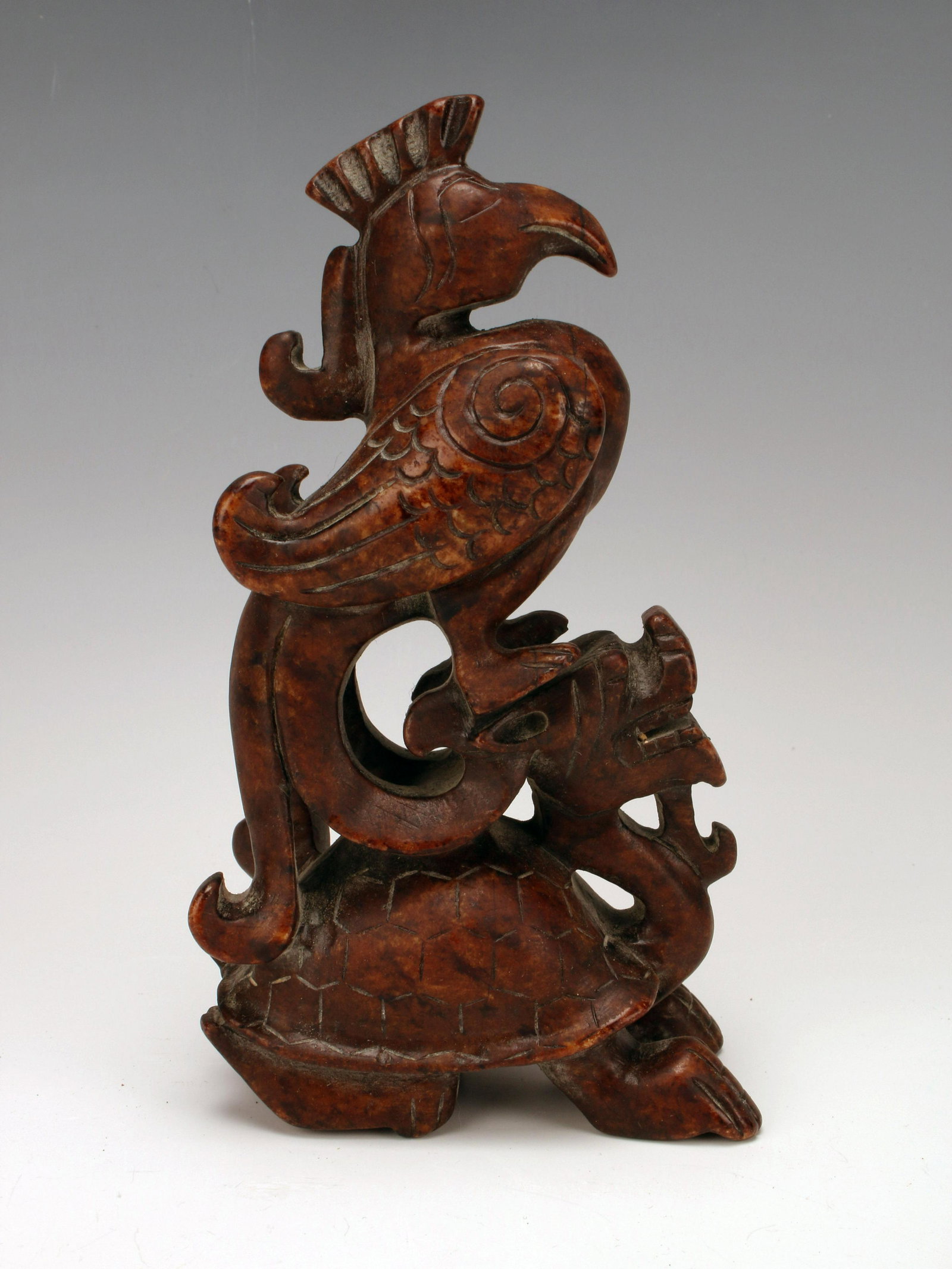 PHOENIX RIDING DRAGON STATUE: PHOENIX RIDING DRAGON STATUE