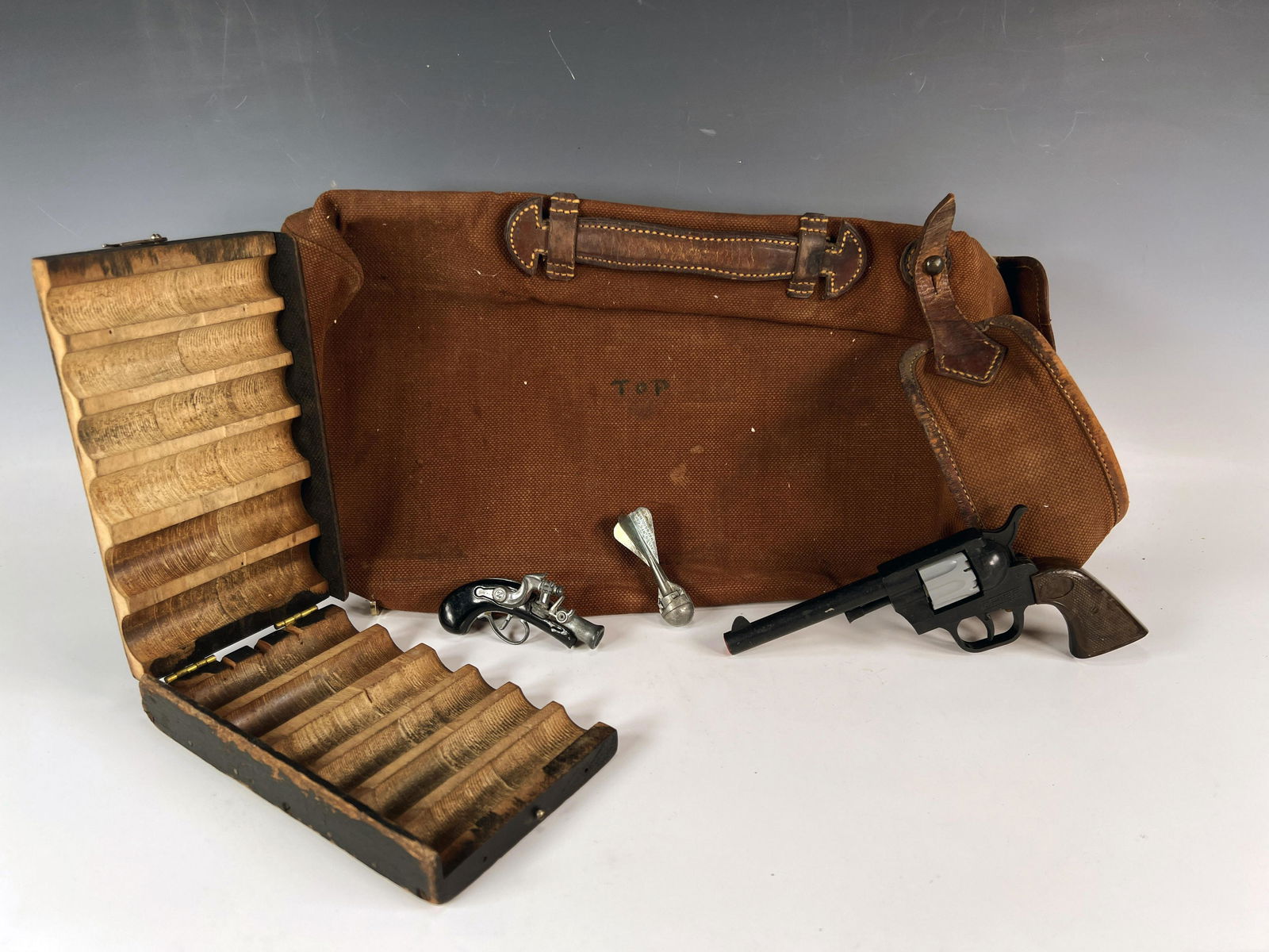 CAP GUNS BAG AND COIN TRAY: CAP GUNS BAG AND COIN TRAY </