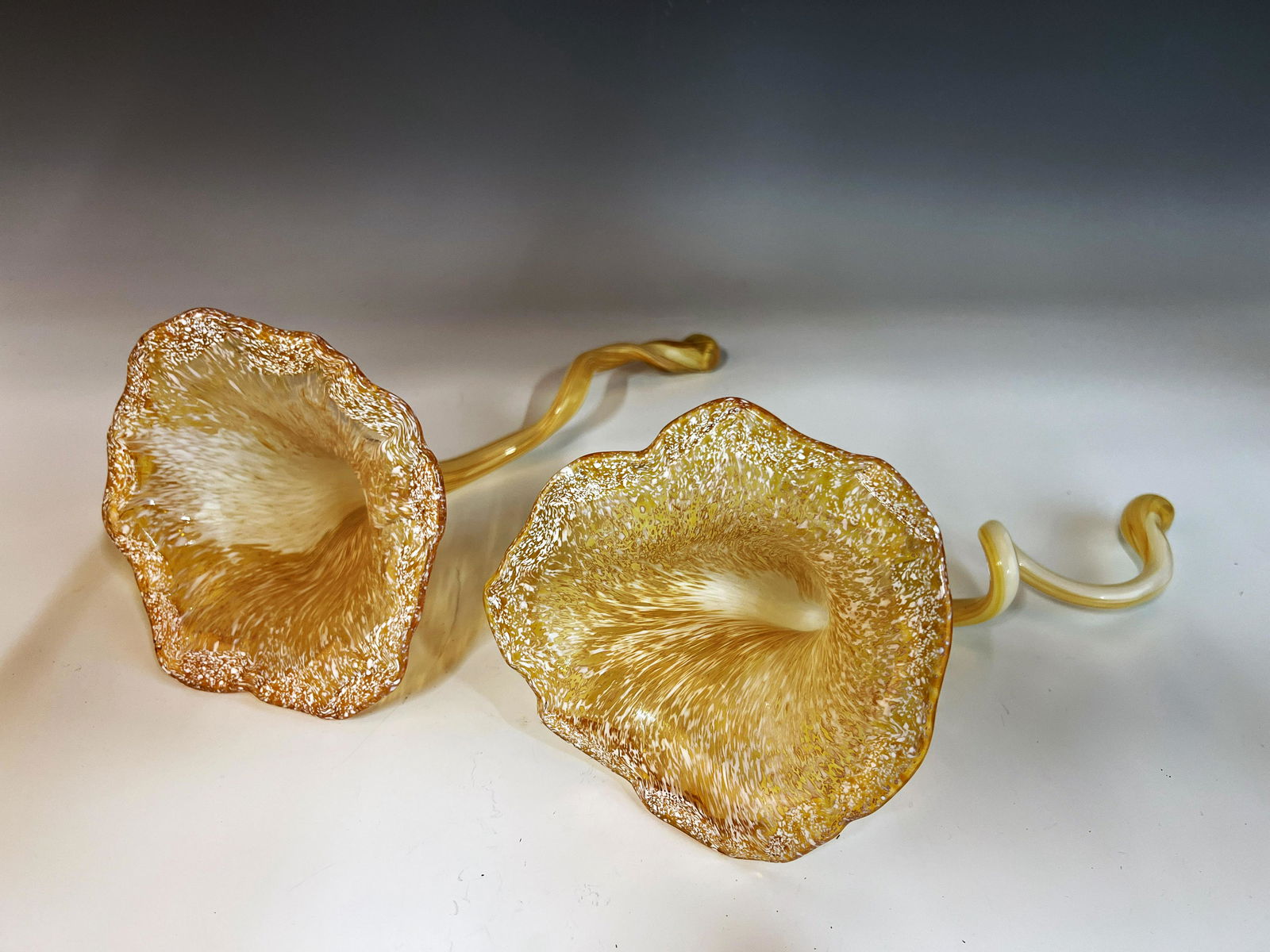 TWO ART GLASS FLOWERS WITH TWISTED STEMS (1 of 3)